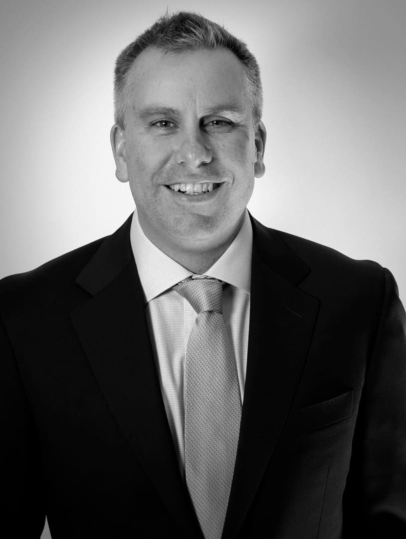 Headshot of Chris Schmidt, Patent and IP litigator at Erise